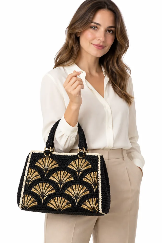 AI concept of a black crochet bag with gold art deco fan mosaic pattern.